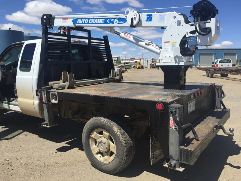 Auto Crane body mounted on a Largo flatbed for lifting and service operations