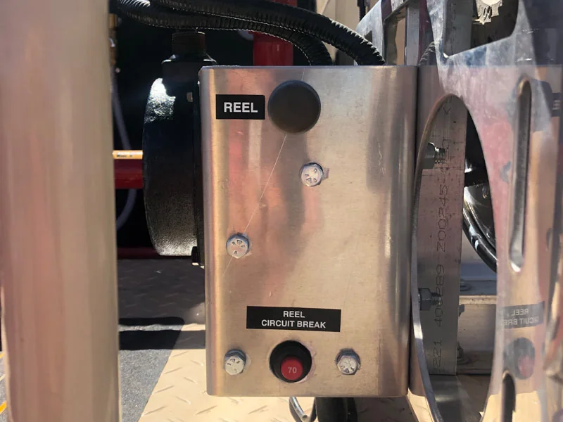 Skid-mounted field equipment controls on a roustabout rig-up build